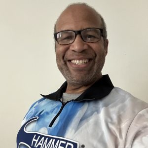 Headshot of Vincent Pearson smiling into the camera.